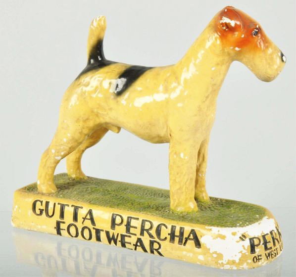 Plaster Statue for Gutta Percha Footwear.: Description 1930s. Statue depicts "Perky" of West Lodge.Condition (Excellent). Size 9 - 1/2" T.