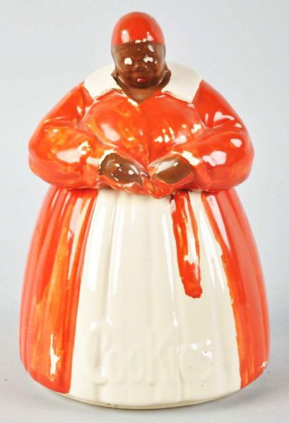 McCoy Mammy Cookie Jar.: Description Circa 1930s to 1940s. Light wear, marks, and some color chips and nicks to only the color sections.Condition (Excellent). Size 11" T.