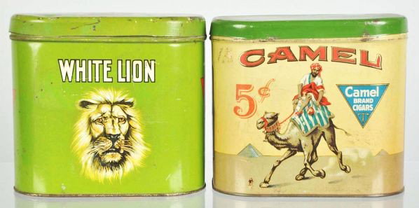 Lot of 2: Cigar Tins.: Description Includes Camel and White Lion. Both tins display very nicely, have good color and shine, and just minimal to modest wear.Condition (Excellent). Size Each: 6 - 1/4" L.