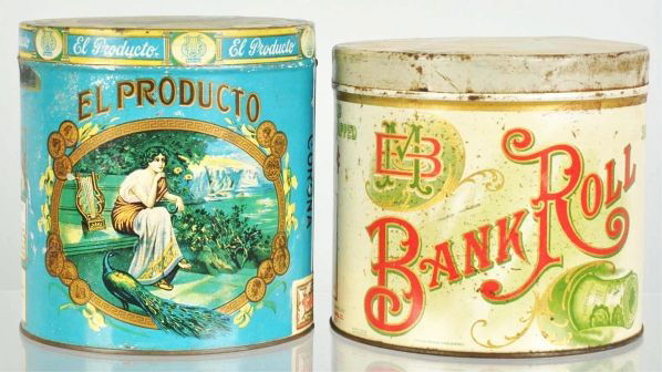Lot of 2: Cigar Tins.: Description Includes Bank Roll with overall wear and El Producto in displayable condition with modest overall wear.Condition (Very Good). Size Largest: 6" T.