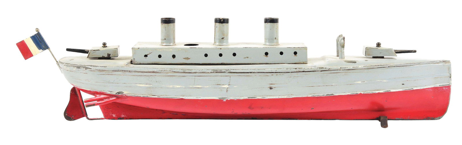 GERMAN HAND-PAINTED LIVE STEAM GUN BOAT.: Three stack, steam unit inside, replacement French flag on the rear of the boat. Missing props. One swinging single gun on front and two funnels. Looks to have been re-painted, pre-war.Condition:(Rest