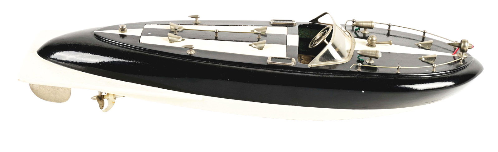 JAPANESE WOODEN BATTERY-OPERATED SPEEDBOAT.: Unusual back tail styling. Looks to be all original. Including windshield and light. Very little wear.Condition:(Excellent).Dimensions:6" x 18" x 3 - 1/4".