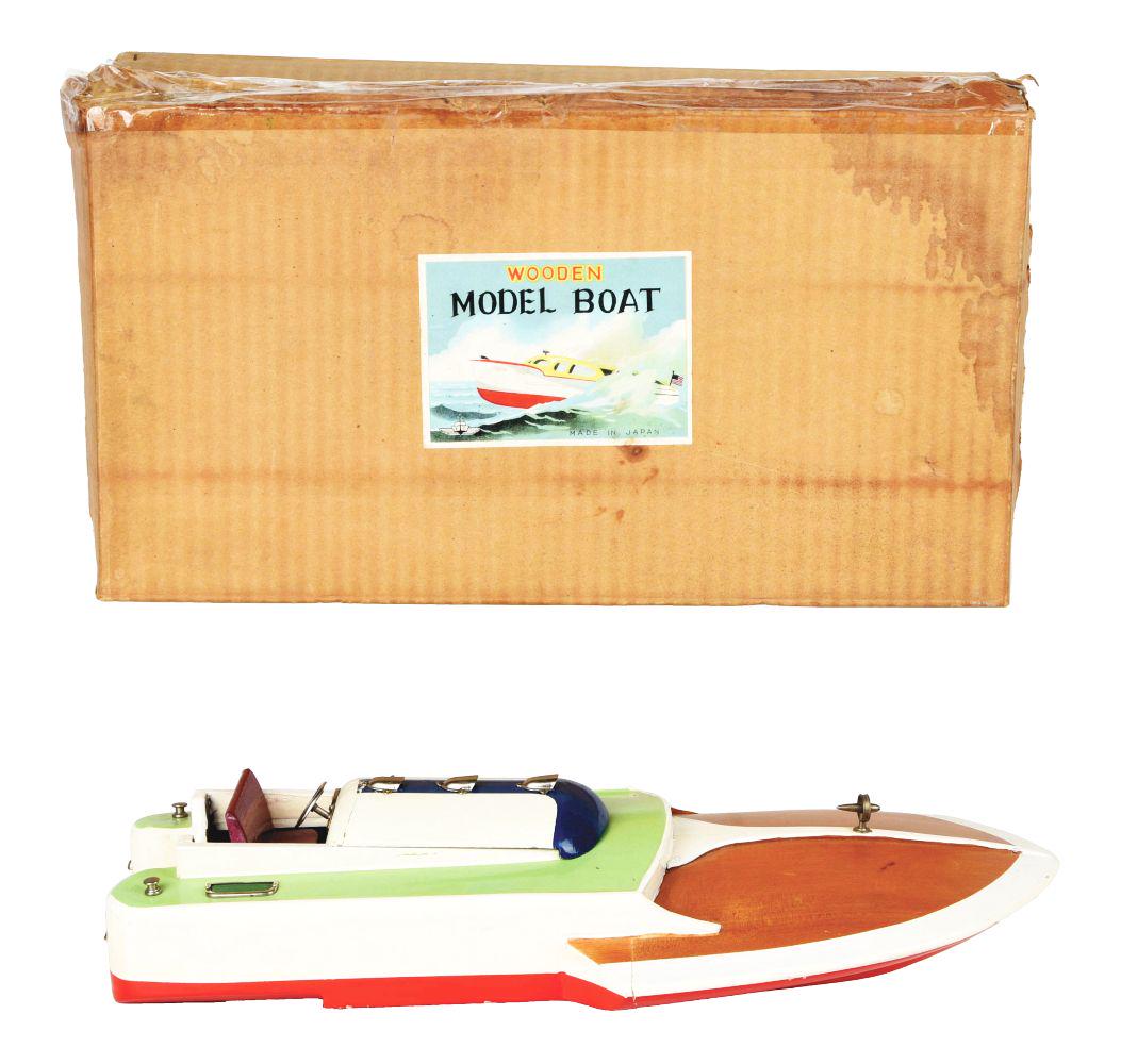 JAPANESE BATTERY-OPERATED WOODEN MODEL RACING BOAT WITH ORIGINAL BOX. (1 of 3)