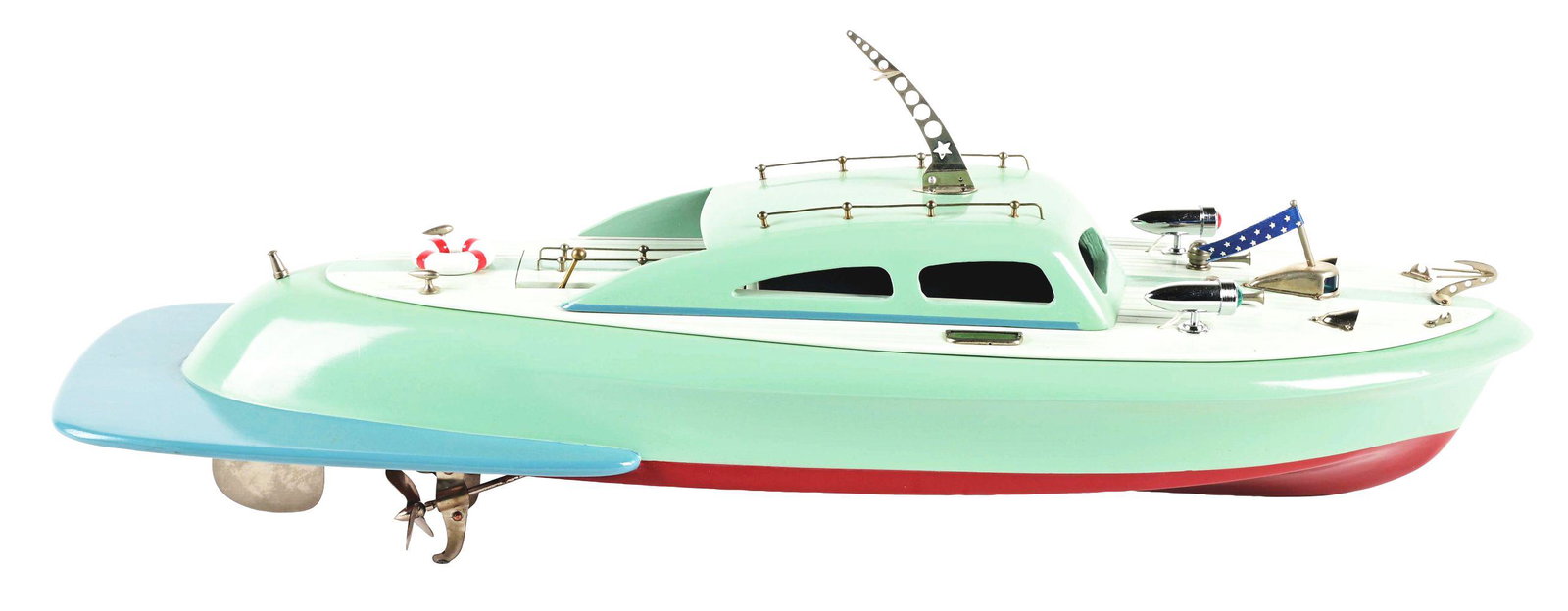 UNUSUAL JAPANESE BATTERY-OPERATED WOODEN BOAT.: Marked "TMY" inside on motor and "ITO Model Made in Tokyo." Unusual shape with boat tail rear and attached fin. Professionally restored in mint green, light blue, dark blue and red. Condition:(Restore