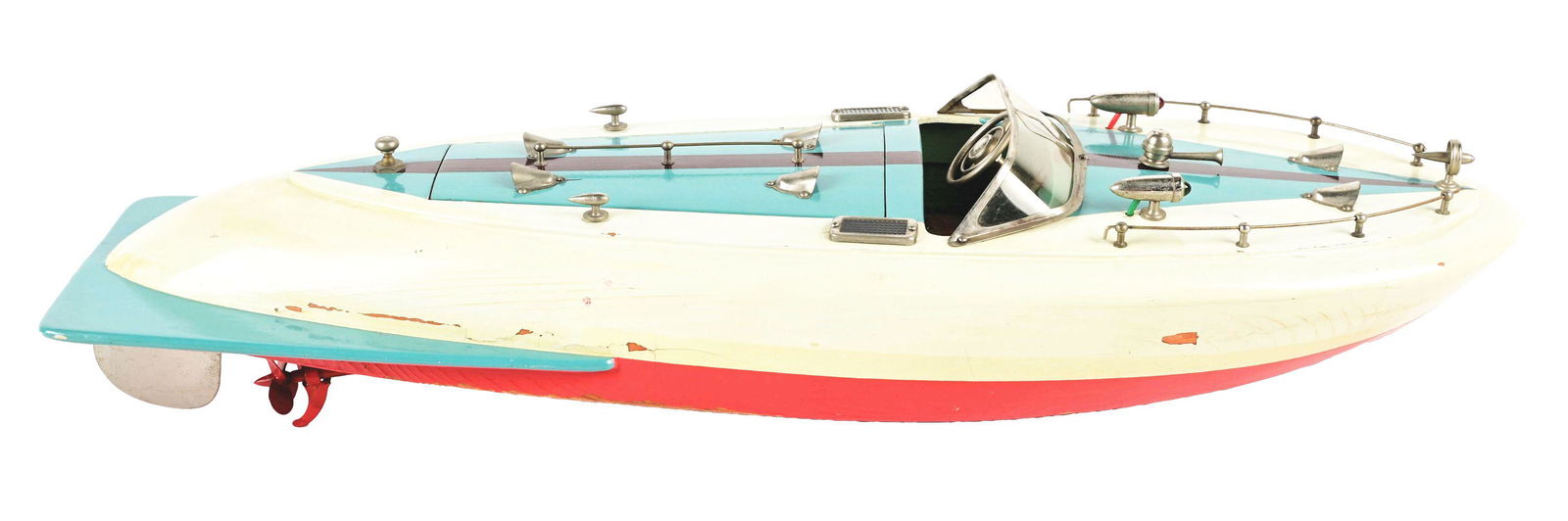 UNUSUAL STYLE JAPANESE BATTERY-OPERATED WOODEN BOAT.: Boat tail speedboat, squared off and rounded rear end. Dual motor marked "TMY." Looks to have replacement American flag. Original windshield. Unusual color combination of teal, maroon, cream and red.