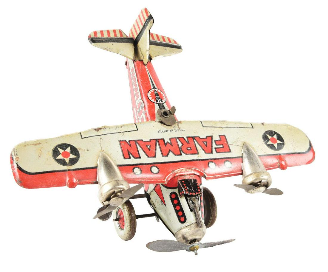 PRE-WAR JAPANESE TIN LITHO WIND-UP FARMAN AIRPLANE. (1 of 3)
