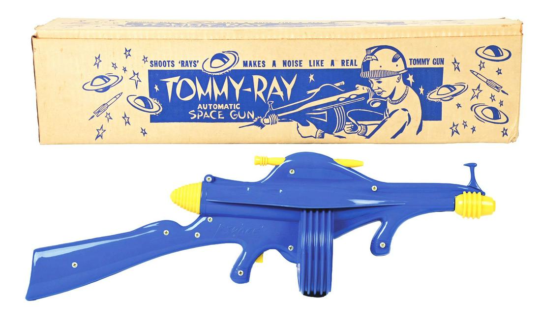 TOMMY-RAY PLASTIC AUTOMATIC SPACE RIFLE IN ORIGINAL BOX.: Made by B-W Molded Plastics in Pasadena, California. Box is absolutely crisp with instruction sheets and inserts. Nice depictions of child shooting ray gun on two sides of box, with operating instruct
