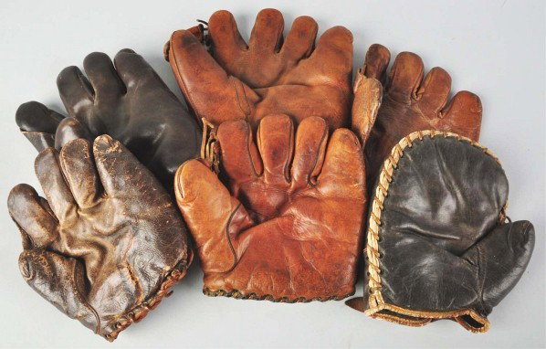 Lot of 6: Vintage Baseball Gloves.: Description Includes one marked "Ted Williams" and one interesting left-handed first baseman's glove. All gloves are well-used.Condition (Very Good).