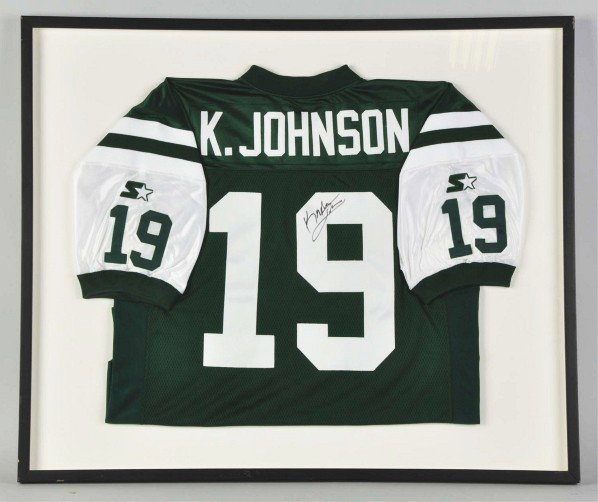 Autographed Keyshawn Johnson New York Jets Jersey: Description Nicely framed. Number 19 on front and back. Comes with an LOA from James Spence.Condition (Near Mint). Size Framed: 31" x 37". Framed: 31" x 37".