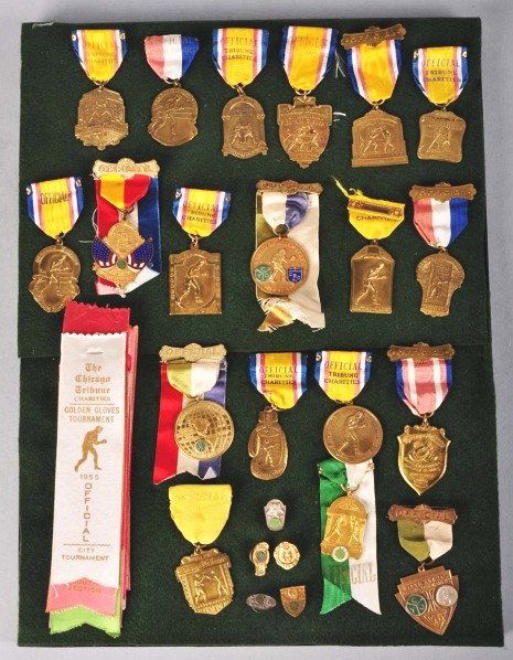 Lot of 19: Vintage Boxing Medals.: Description 1930s to 1950s. Mostly from Chicago and New York tournaments and mostly Golden Gloves. Includes approximately 19 ribbons as well.Condition (Very Good - Excellent). Size Largest: 6" L. Larg