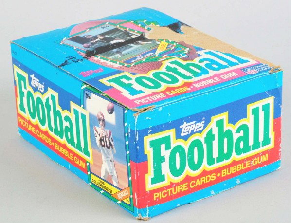 Unopened 1986 Topps NFL Football Wax Box.: Description Includes 36 unopened packs with the possibility of a lot of quality Rookies including Jerry Rice, Bernie Kosar, and others. Plus other Rookies like Reggie White and Steven Young. Box has s