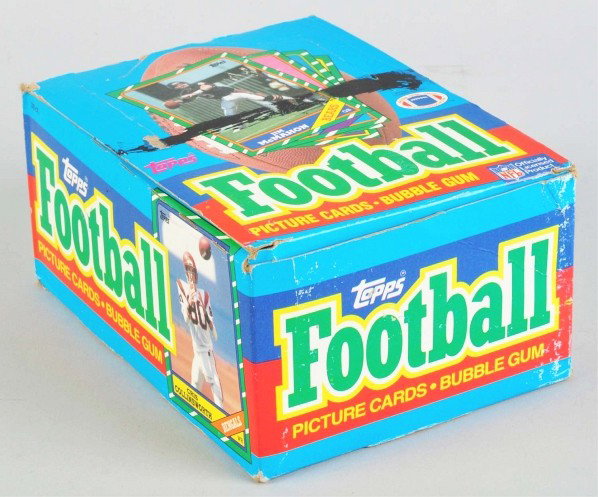 Unopened 1986 Topps NFL Football Wax Box.: Description Includes 36 unopened packs with the possibility of a lot of quality Rookies including Jerry Rice, Bernie Kosar, and others. Plus other Rookies like Reggie White and Steven Young. Box has s