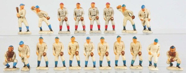 Lot of 20: Auburn Rubber Baseball Player Figures.: Description Circa 1950s. Some with red caps and some with blue caps. Some chipping and wear. One is broken and not pictured.Condition (Very Good). Size Largest: 3" T. Largest: 3" T.