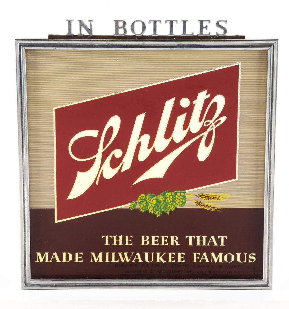 FRAMED SCHLITZ "THE BEER THAT MADE MILWAUKEE FAMOUS" SIGN. (1 of 2)