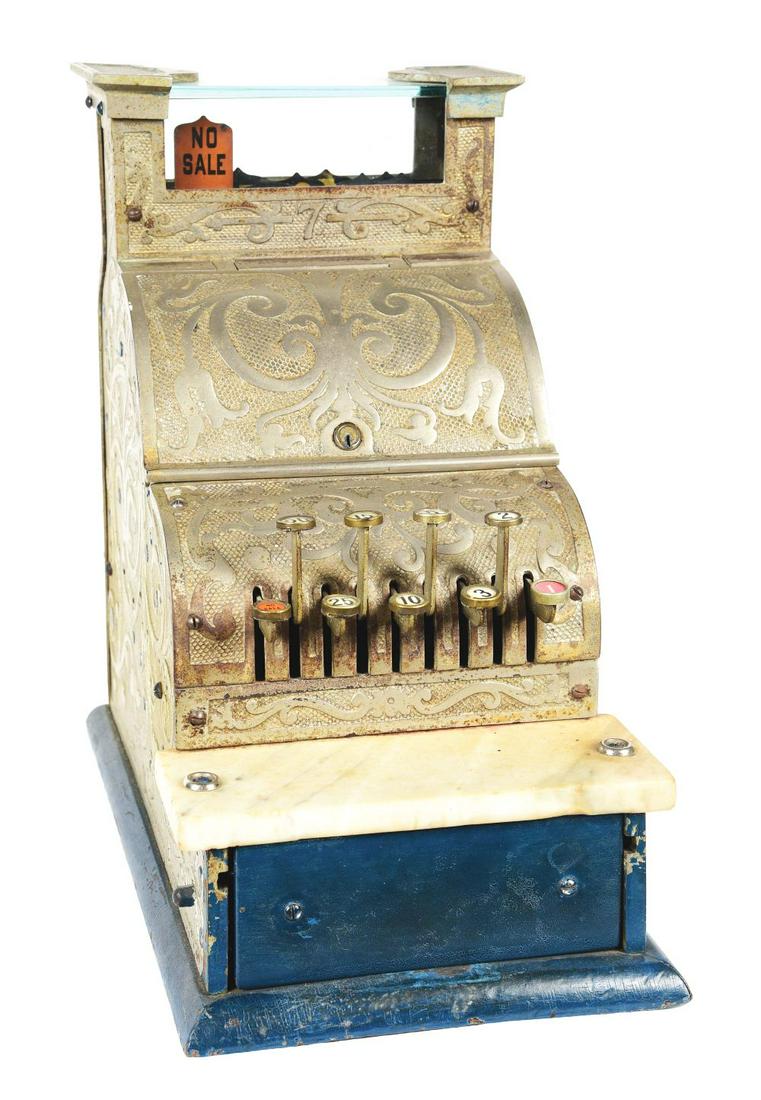 NATIONAL CASH REGISTER MODEL 7 SERIAL NUMBER 5392890Y.: A nice original example of a National Cash Register Model 7 in original nickel finish. CONDITION: Shows original key checks, price flags with original nickel and marble slab, missing the front drawer