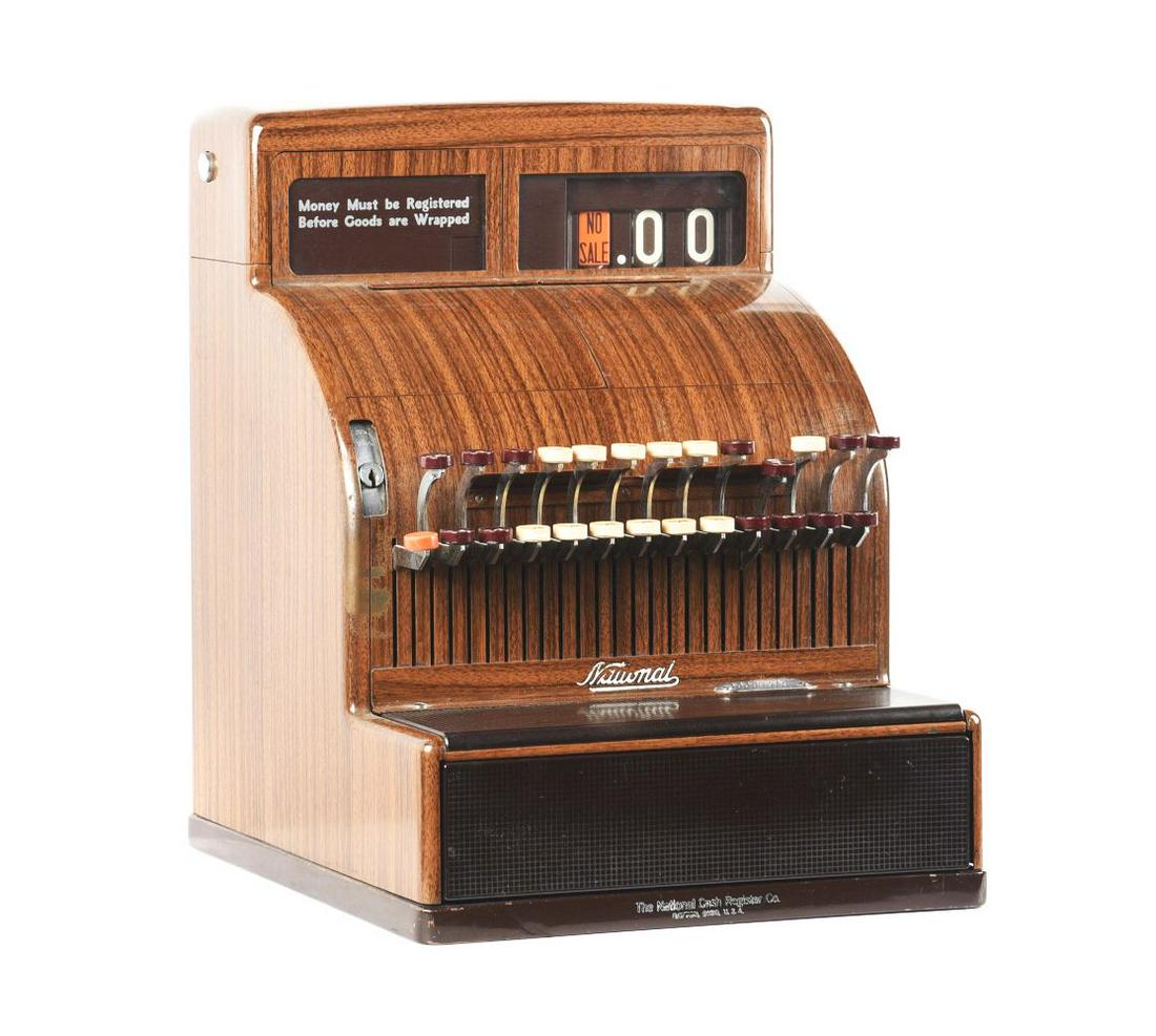 NATIONAL CASH REGISTER MODEL 126(2)X.: National Cash register model 126, complete and in working order. Wood grain finish with Light scratches and signs of wear. Condition:(Very Good).13 - 1/4" x 15" x 17".Dimensions: