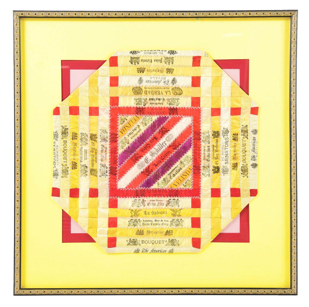 FRAMED CLOTH ADVERTISEMENT FOR THE F. SCHILLER CO. CIGARS.: This cloth advertisement appears to be quilted and shows all of the brands sold by the F. Schiller Tobacco Co., such as their Bouquet, Log Cabin brand, Velinda and many others. CONDITION: Shows light 
