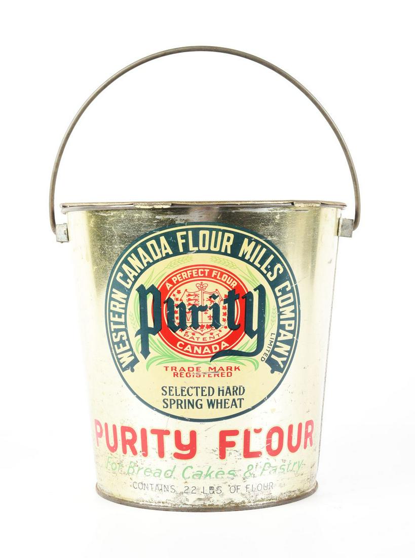 PURITY FLOWER PAIL CONTAINER.: A very nice example of a Purity flower pail with graphic lid. Some wear and paint loss, but a great kitchen decorator piece. Condition:(Very Good).11 - 3/4" x 11 - 3/4" x 11 - 1/2".Dimensions: