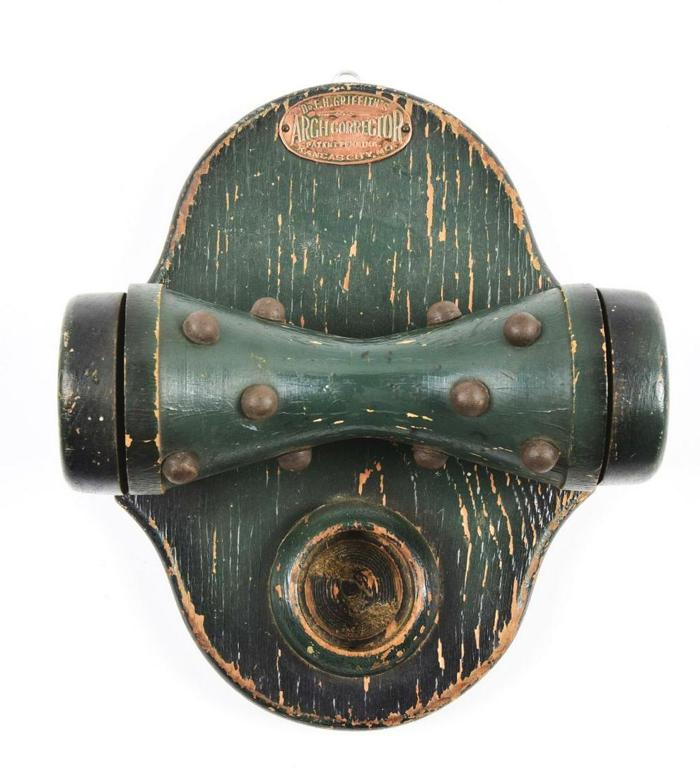 DR. F. H. GRIFFILTH'S ARCH CORRECTOR.: Interesting shoe store item marked with Dr. F.H. Griffilth for correcting arch support. Wood construction with some paint loss and original brass tag. A Great country store shoe item. Condition:(Good)