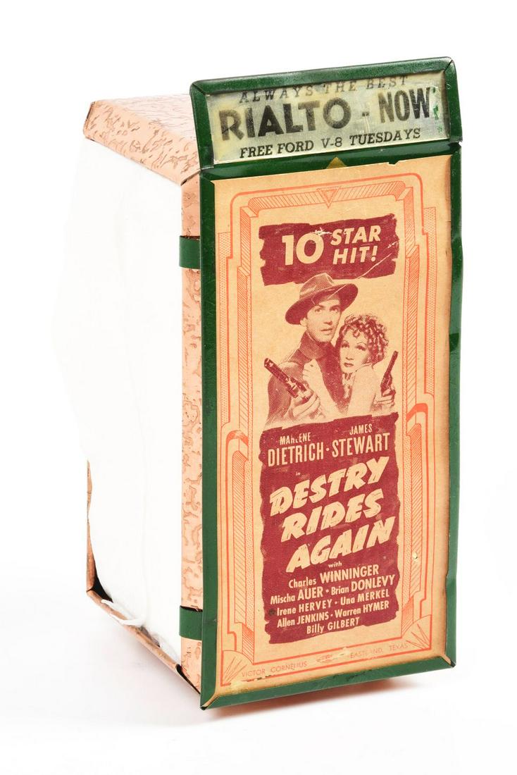 DESTRY RIDES AGAIN ADVERTISING NAPKIN HOLDER.: Great advertising napkin holder form the 1950's. Great advertising is original and the napkin holder is complete. Condition:(Good).4" x 4" x 8 - 1/4".Dimensions: