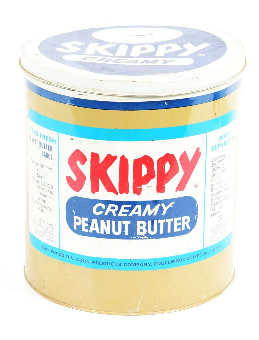 LARGE SKIPPY PEANUT BUTTER TIN COIN BANK. (1 of 2)