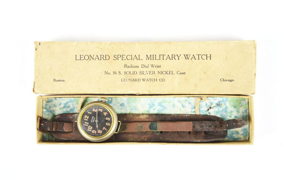 LEONARD WATCH IN ORIGINAL BOX.: Leonard military watch with solid silver nickel case and leather strap in open box. Runs.Condition:(Very Good - Excellent).BoxDimensions: