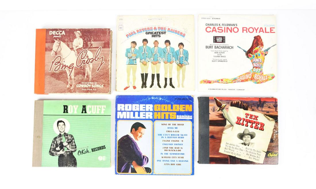VINTAGE RECORD ALBULMS.: Including Bing Crosby, an album of cowboy songs, Roy Acuff country music, Paul Revere & the Raiders Greatest Hits with some pen writing on the cover, a Casino Royal James Bond, a Roger Miller Golden H