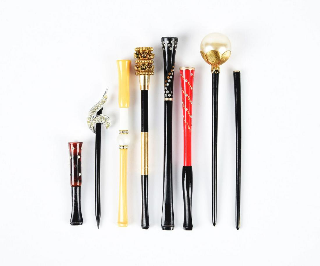 LOT OF 7: CIGARETTE HOLDERS AND RODS. (1 of 1)