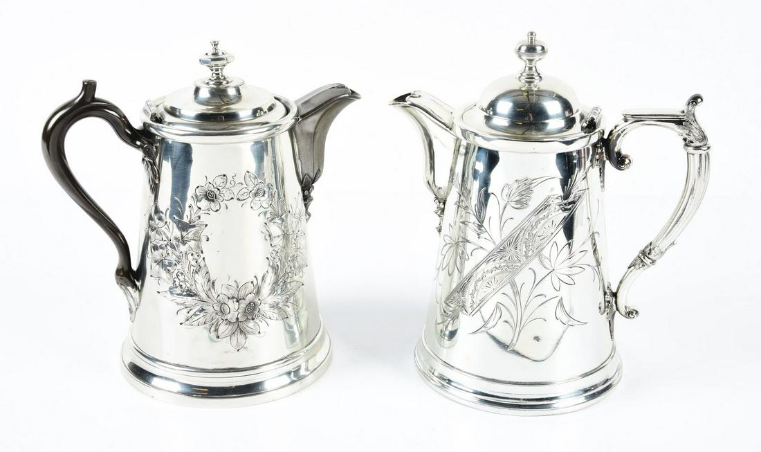 LOT OF 2: SILVER PLATED WATER OR COFFEE PITCHERS.: C. 1890. Both etched and with hinged lids. No damage or repairs.Condition:(Excellent).Each: 11 - 1/2" x 10 - 1/4" x 7 - 1/2".Dimensions: