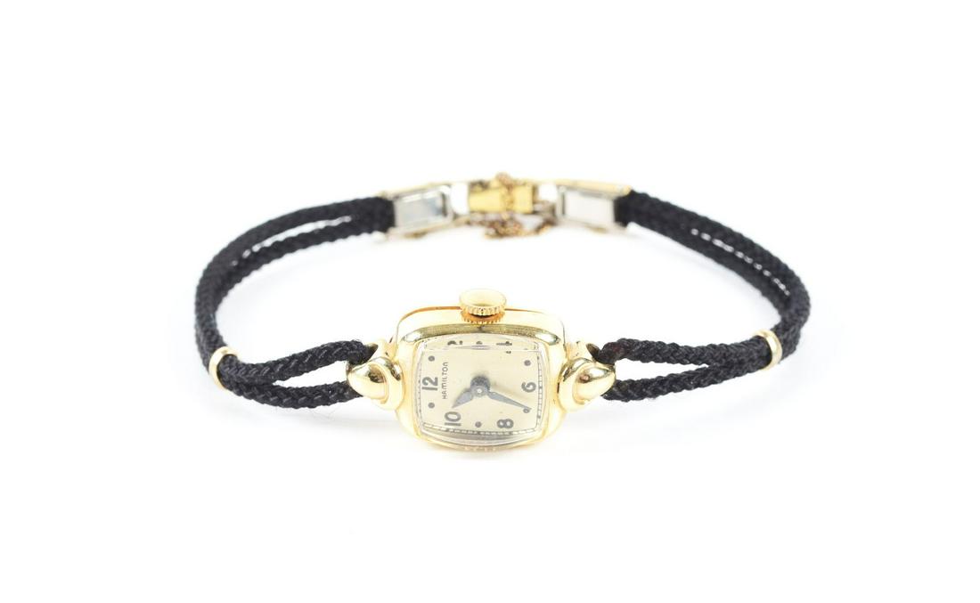 14K HAMILTON LADIES' WATCH.: Running at time of description.Condition:(Good).Dimensions: