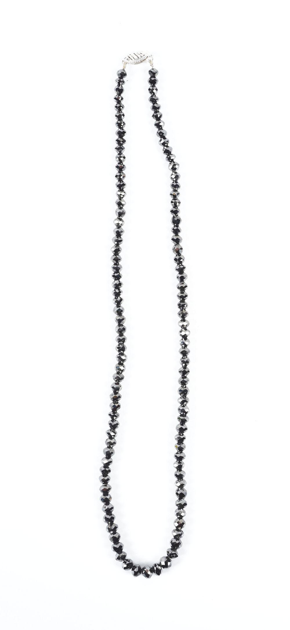 BLACK BEAD NECKLACE.: Black bead necklace with 14K clasp. Possibly diamonds, but will not test. No damage or repairs. Condition:(Excellent).Dimensions: