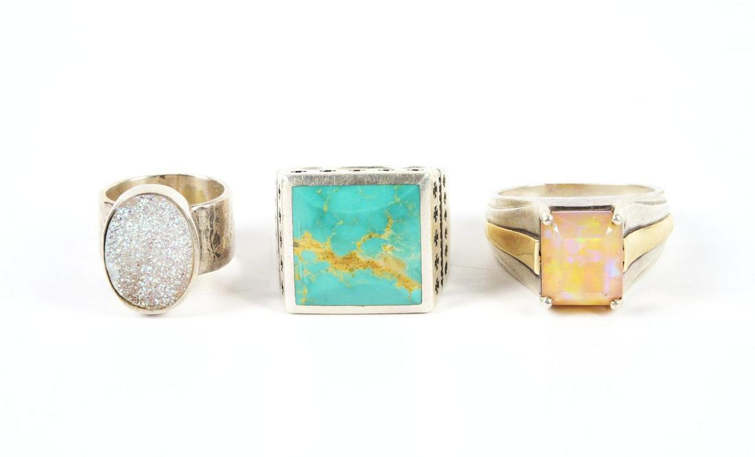 LOT OF 3: STERLING SILVER RINGS.: Three sterling silver rings. The first with opal, size 14 - 1/2, the second with turquoise, size 14, and the third with drusy quartz, size 7 - 1/2.Condition:Dimensions: