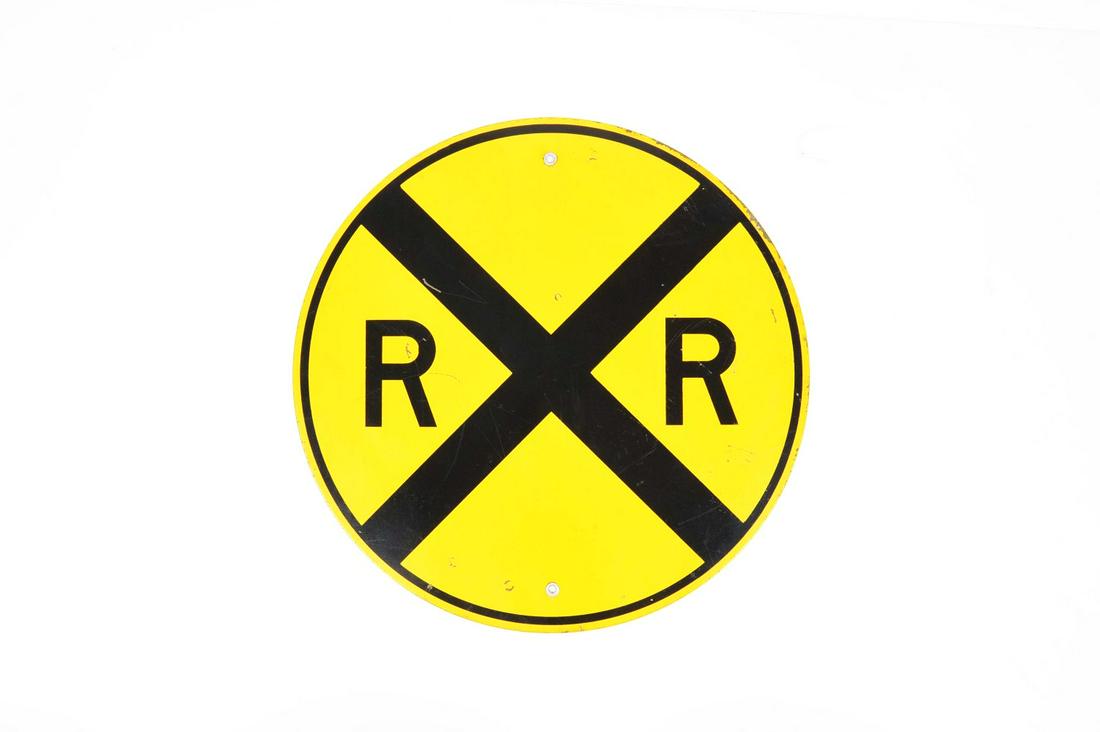 RAILROAD CROSSING ROAD SIGN.: R X R pole-mounted road sign. Yellow field paint with black letters and border.Condition:(Very Good).24" D.Dimensions: