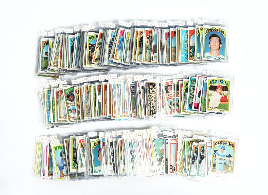 SHOEBOX LOT OF VARIOUS 1970S, 80S, 90S, AND MORE CONTEMPORARY BASEBALL, BASKETBALL, FOOTBALL, AND: A lot of common, a few modern stars and a few Hall of Famers. Various conditions.Condition:(Very Good).Each: 3" x 4 - 1/2".Dimensions: