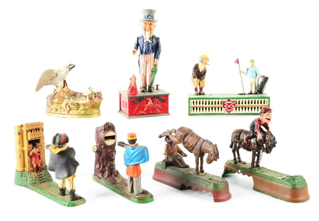 LOT OF 7: CAST IRON MECHANICAL BANKS. (1 of 1)