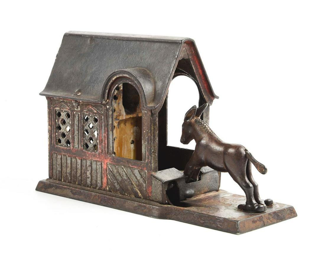 MULE ENTERING BARN MECHANICAL BANK. (1 of 2)