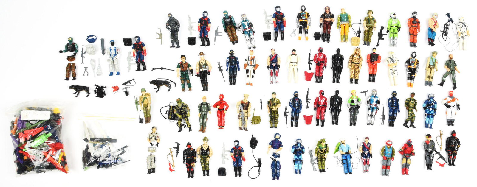 LOT OF APPROX. 50: SMALLER G.I. JOE FIGURES.: Some are in bags, some are loose and there are accompanying weapons in bags. Various conditions.Condition:(Very Good).Largest: 3 - 3/4" x 1 - 1/2".Dimensions: