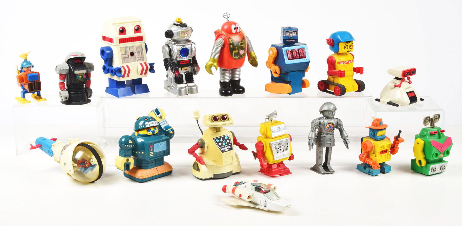 LARGE LOT OF WIND-UP, FRICTION & BATTERY-OPERATED CONTEMPORARY ROBOT FIGURES.: Some are just for parts.Condition:(Good - Very Good).Largest: 5" x 5" x 7".Dimensions: