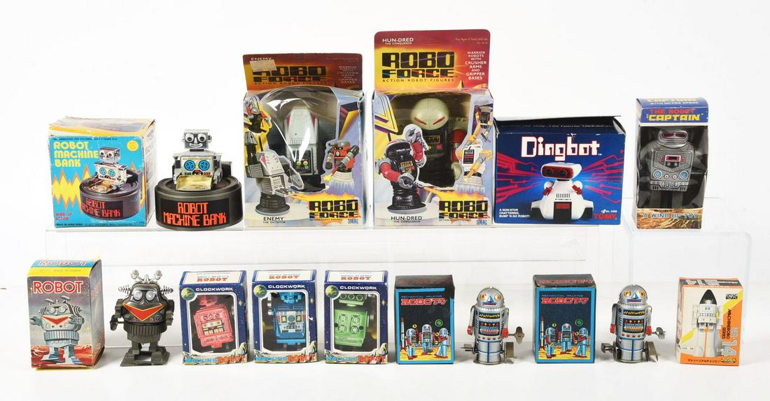 LOT OF 12: VARIOUS MOSTLY FOREIGN-MADE BATTERY-OPERATED & WIND UP ROBOTS.: All in original boxes. Makers from Korea, Taiwan, Hong Kong and others. Various conditions.Condition:(Very Good).Largest: 6" x 3 - 1/2" x 10".Dimensions: