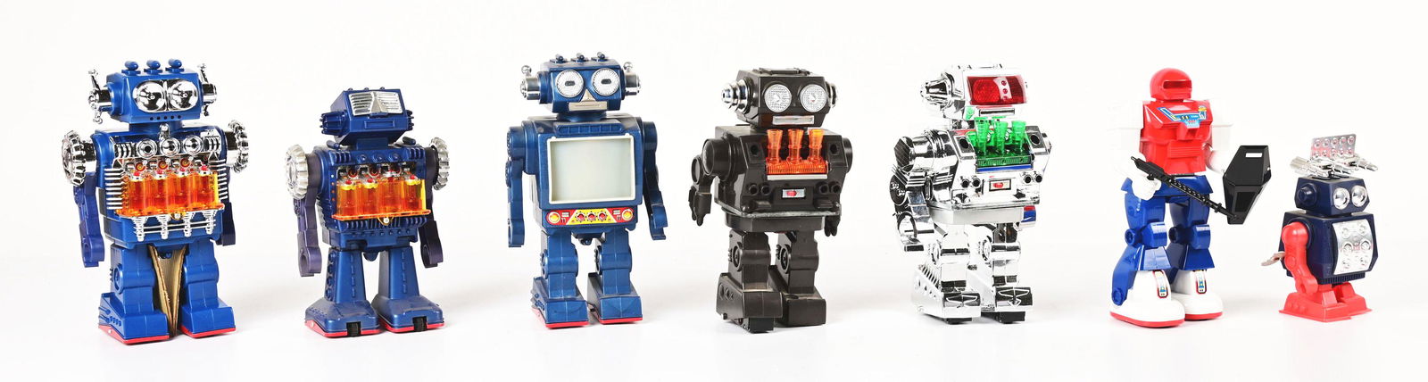 LOT OF 7: JAPANESE BATTERY-OPERATED & WIND-UP ROBOTS MOSTLY PLASTIC IN ORIGINAL BOXES. (1 of 2)