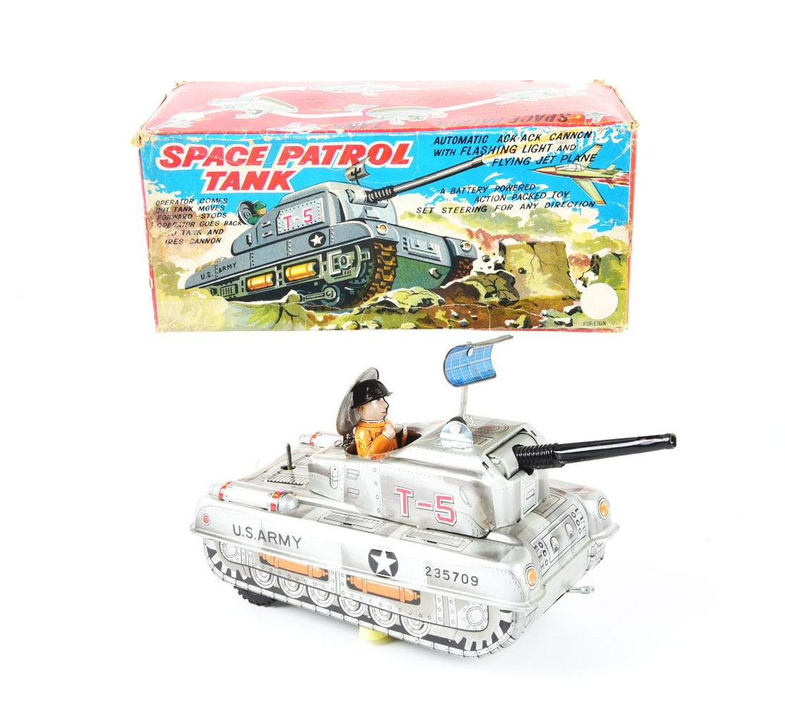 BATTERY-OPERATED SPACE CONTROL TANK.: In original box. Japanese. Marked "Foreign" on box and toy. Has front gun moving radar detector, and soldier inside tank. Box has some creasing, and toy has little wear.Condition:(Very Good - Excellen