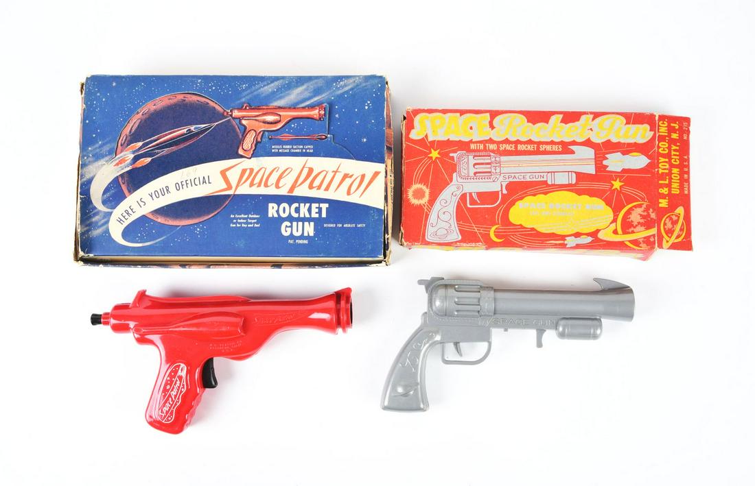 LOT OF 2: AMERICAN-MADE PLASTIC SPACE ROCKET GUNS IN ORIGINAL BOXES.: One is a Space Rocket Gun, and the other is a Space Patrol Rocket Gun. Condition:(Very Good - Excellent).Largest Box: 11 - 1/2" x 7" x 2". Dimensions: