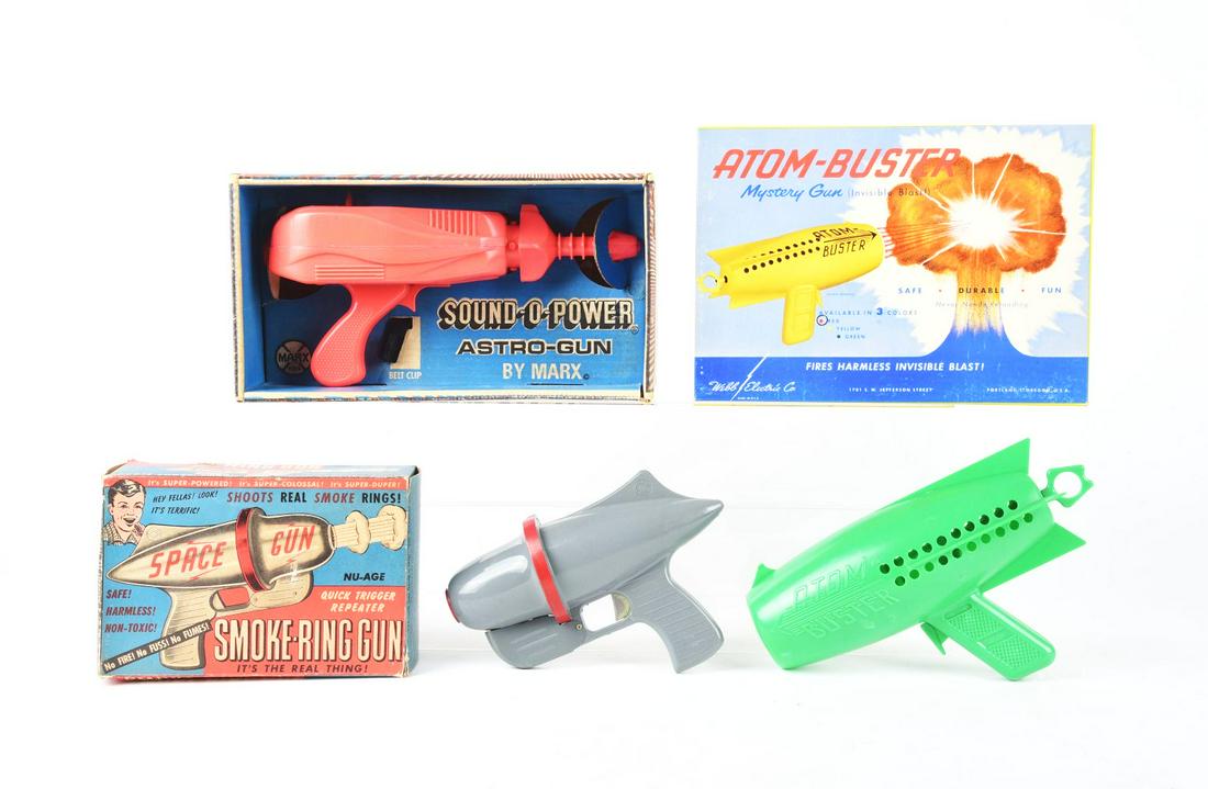LOT OF 3: AMERICAN-MADE PLASTIC SPACE PISTOLS IN ORIGINAL BOXES.: One is a Atom Buster, Marx Sound of Power and a Smoke Ring Space Gun. Condition:(Very Good - Excellent).Largest Box: 13" x 7" x 5 - 1/4" .Dimensions: