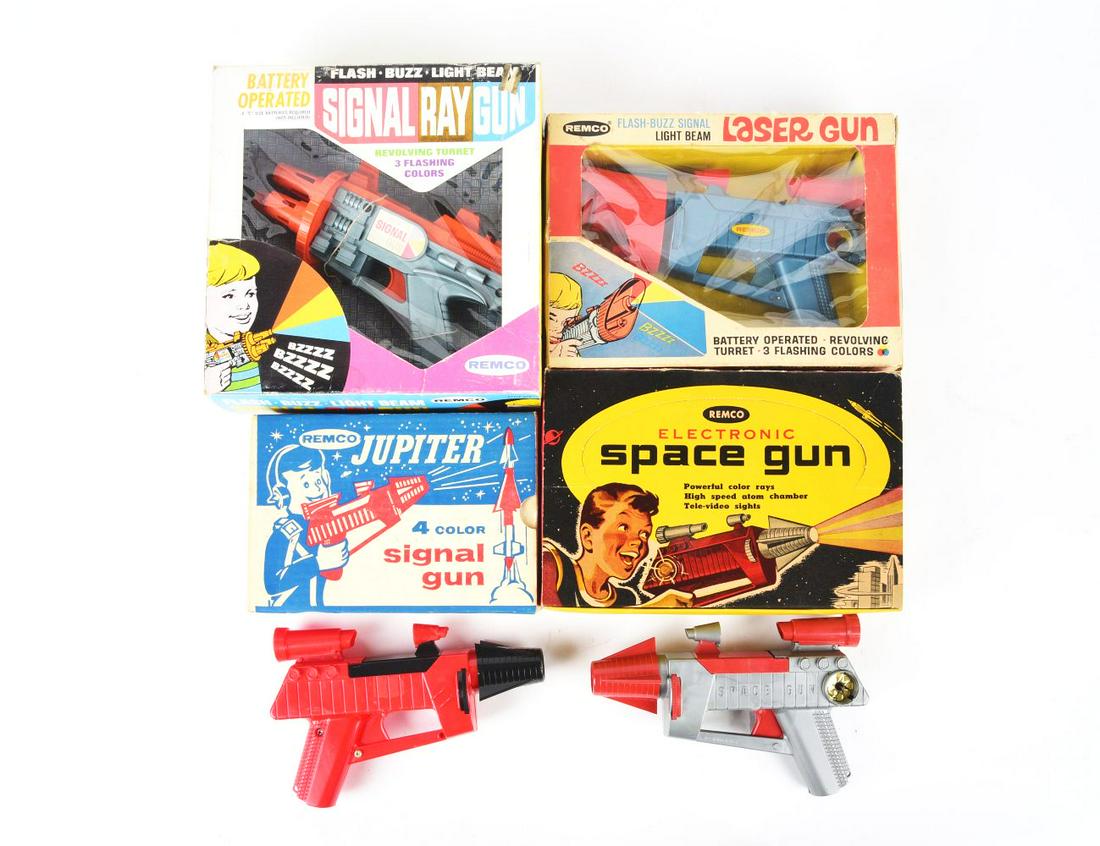 LOT OF 4: REMCO PLASTIC SPACE GUNS IN ORIGINAL BOXES.: There's a Laser Gun, Jupiter Signal Gun, Signal Ray Gun and an Electronic Space Gun. All battery-operated.Condition:(Very Good - Excellent).Largest Box: 10 - 1/2" x 10 -3/4" x 3 - 3/4".Dimensions: