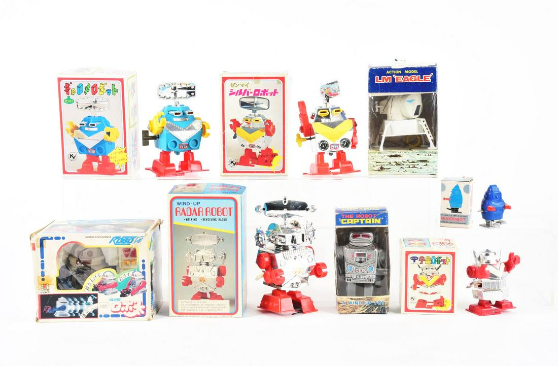 LOT OF 8: VARIOUS JAPANESE BATTERY-OPERATED & WIND-UP ROBOTS IN ORIGINAL BOXES. (1 of 1)