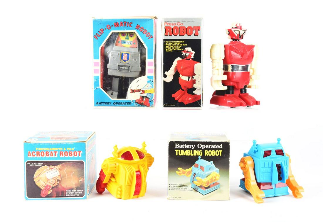 LOT OF 4: PLASTIC BATTERY-OPERATED ROBOTS. (1 of 1)