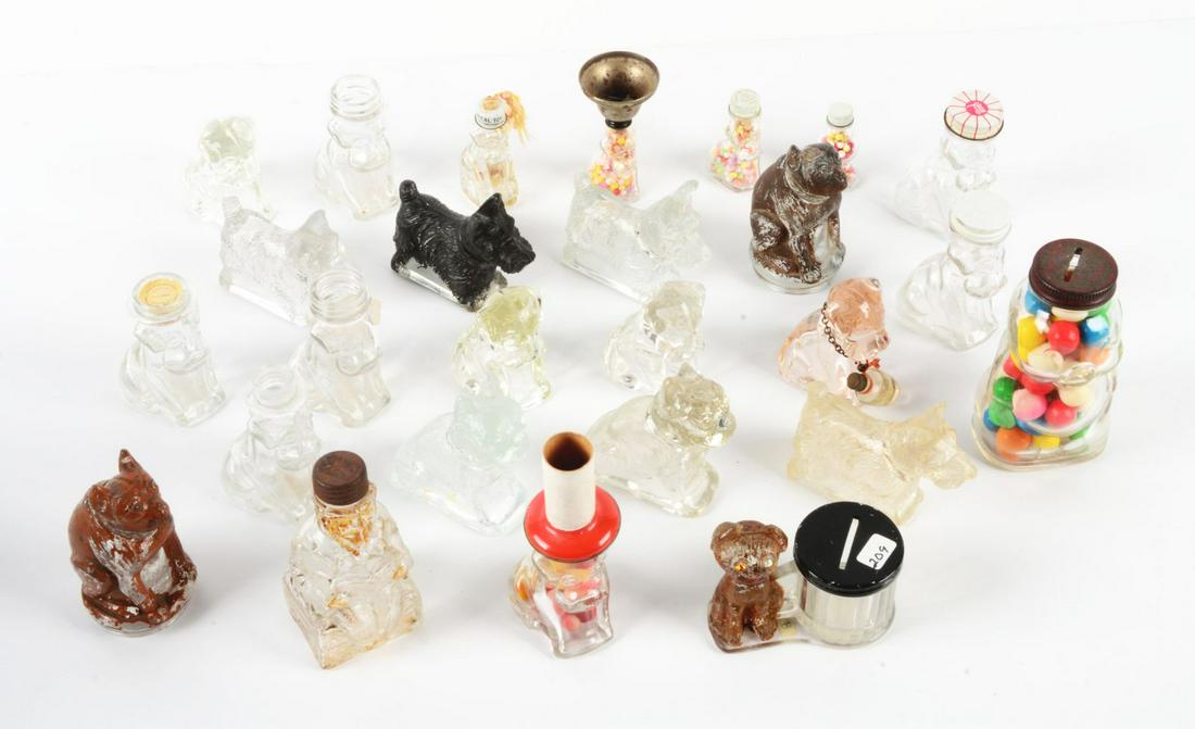 LOT OF 26: VINTAGE GLASS MOSTLY DOG CANDY CONTAINERS. (1 of 1)
