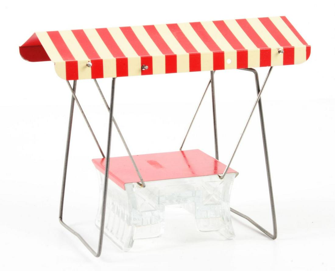 VINTAGE GLASS SWING CANDY CONTAINER.: Vintage swing candy container is mint condition, with no damage.Condition:(Mint).6" x 3 - 1/2" x 5".Dimensions: