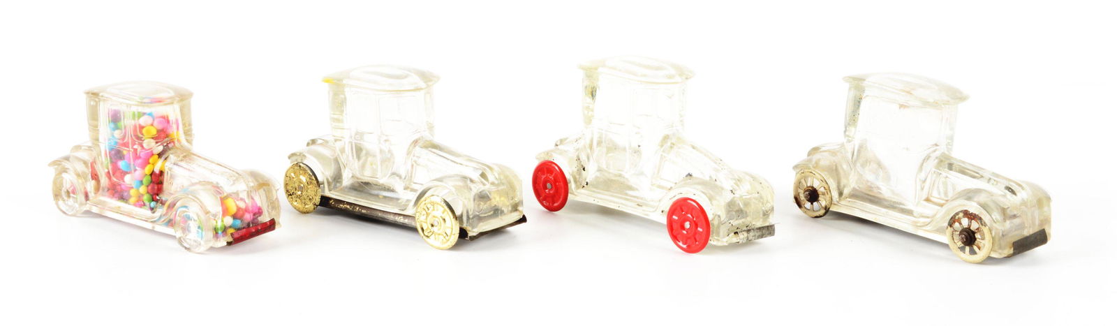 LOT OF 4: VINTAGE GLASS HIGH CAB COUPE CANDY CONTAINERS. (1 of 2)