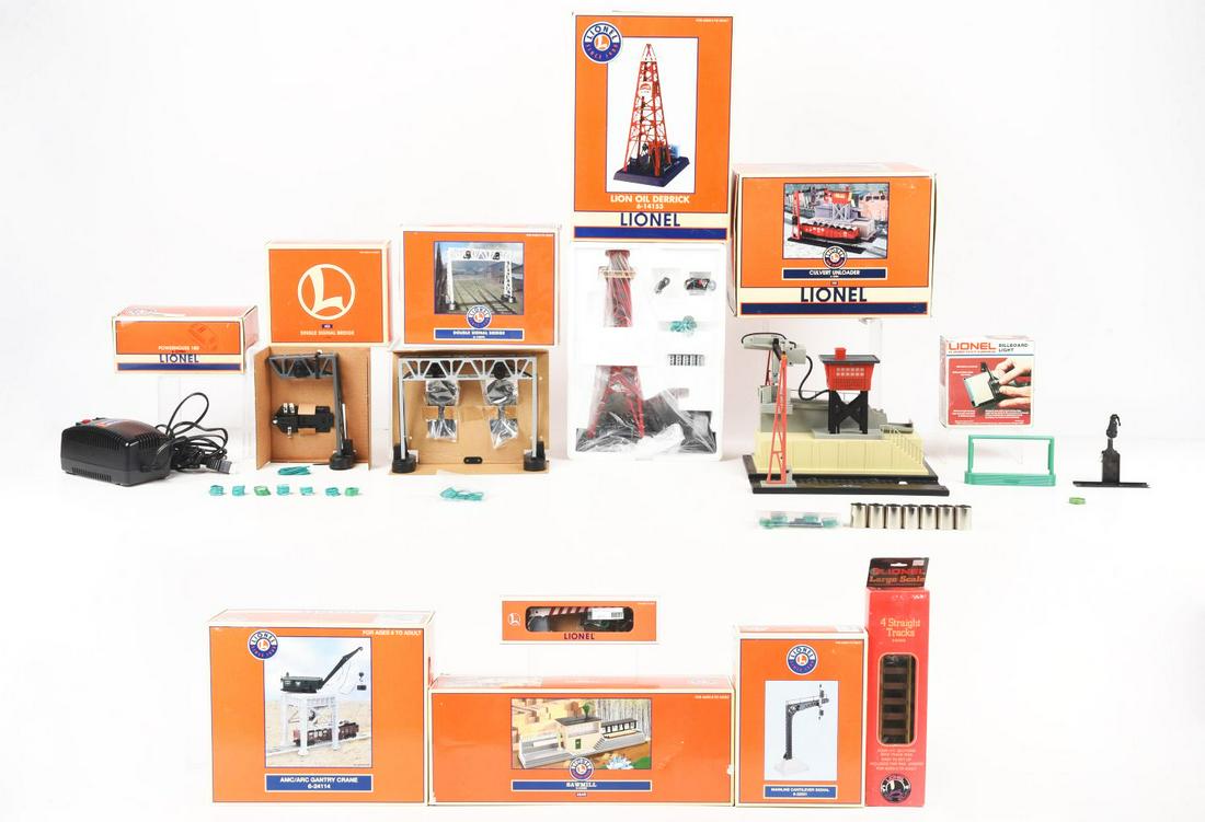 LOT OF 11: VARIOUS CONTEMPORARY LIONEL TRAIN ACCESSORIES. (1 of 1)